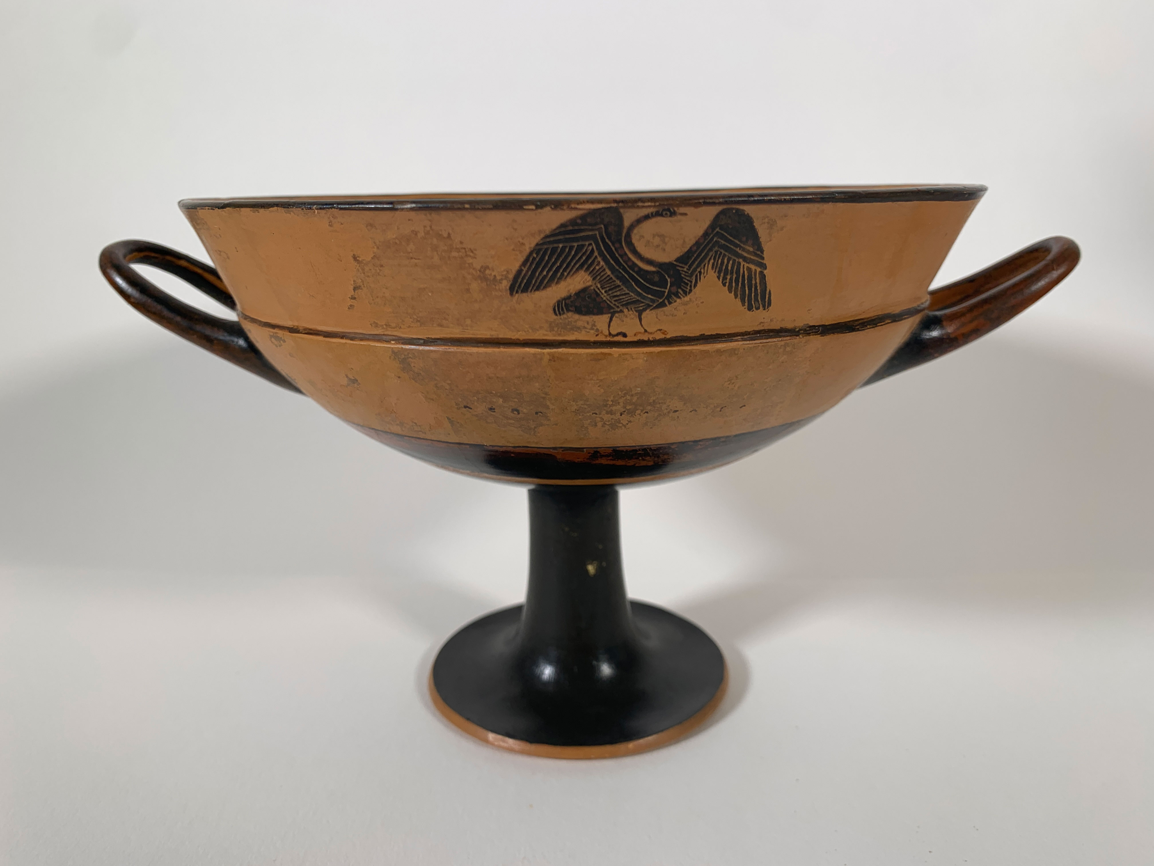 Attic Black-Figure Lip Cup attributed to Tleson depicting a swan with raised wings, circa 550-500 BC
