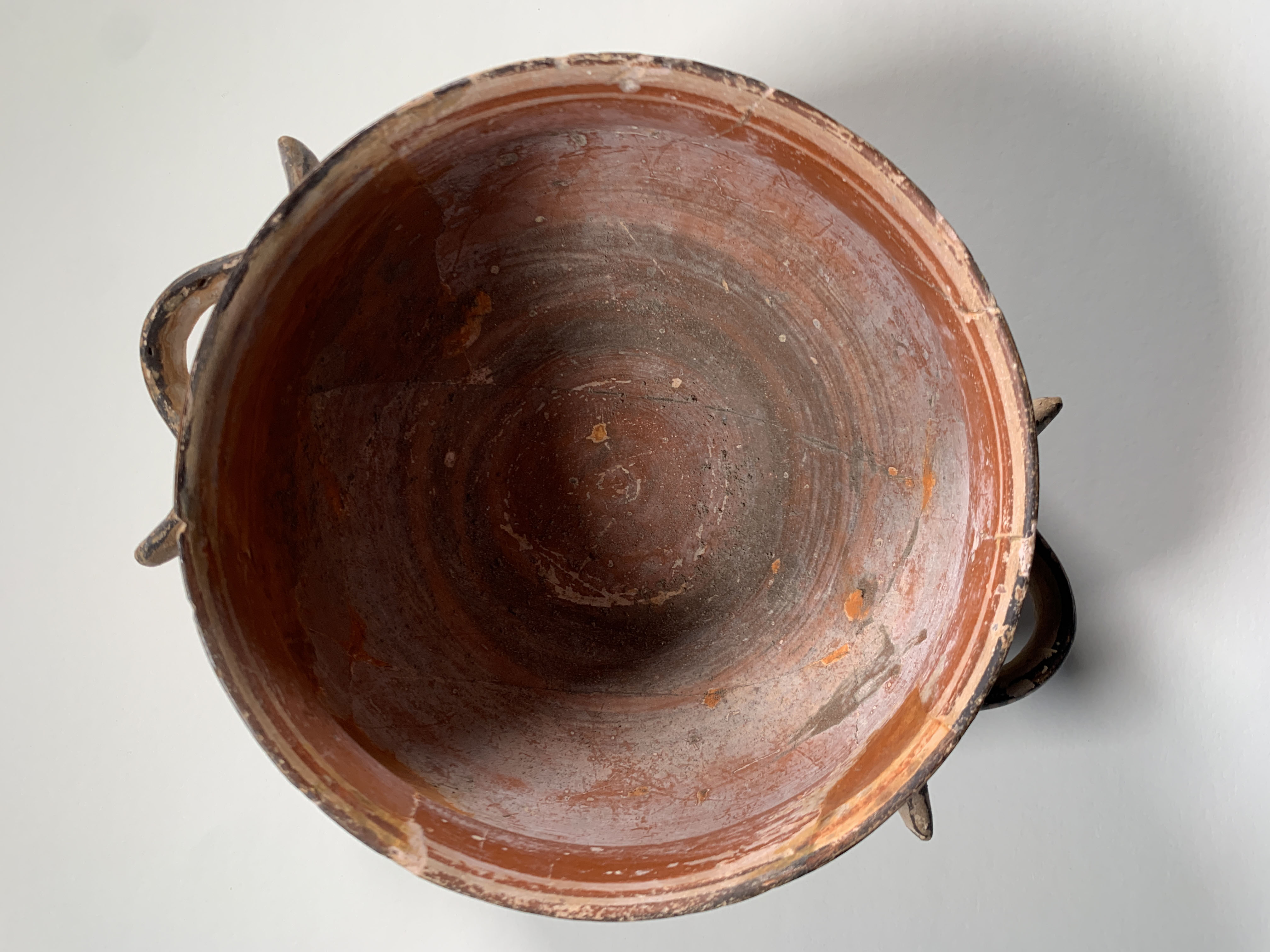 Interior view showing red-brown wash